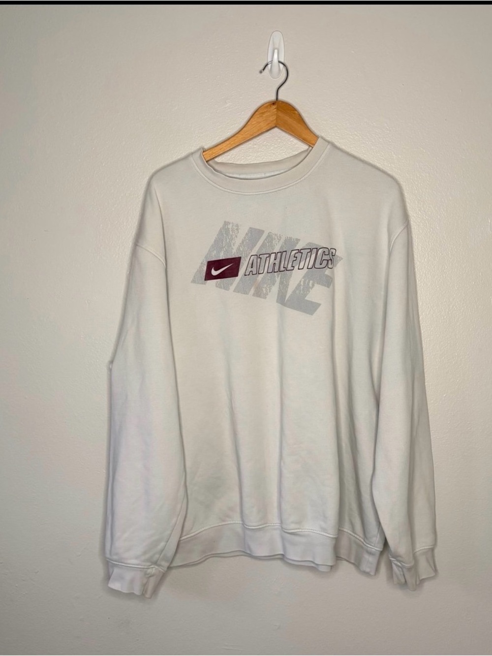 Nike Men's White Crewneck Sweatshirt with 'Athletics' Graphic